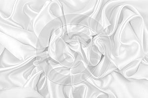 Luxurious of smooth white silk or satin fabric texture background