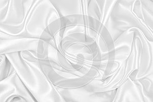 Luxurious of smooth white silk or satin fabric texture background