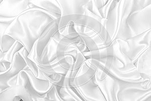 Luxurious of smooth white silk or satin fabric texture background