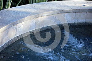 Luxurious spanish style pool jacuzzi hot with luxury water feature fountain at gorgeous villa with ocean view in Los Cabos Mexico