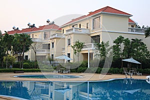 Luxurious swimming pool side of rich hotel