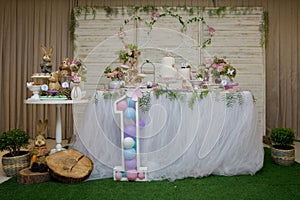 Luxurious table of sweets and birthday cake