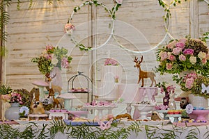 Luxurious table of sweets and birthday cake