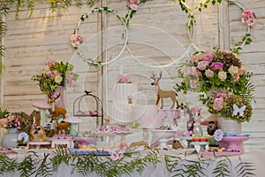 Luxurious table of sweets and birthday cake