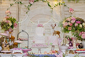 Luxurious table of sweets and birthday cake