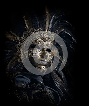 Luxurious venetian mask isolated on black photo