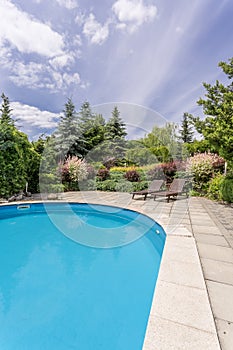 Luxurious villa garden with a pool
