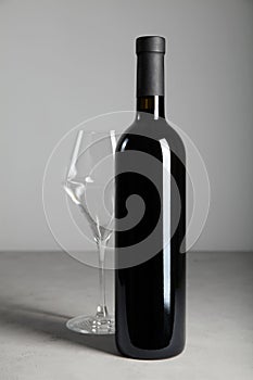 Luxurious vintage red wine in a black glass bottle