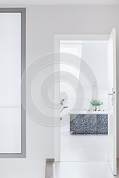 Luxurious white attic bathroom