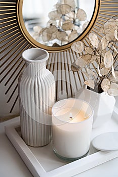 Luxurious white tray decoration, home interior decor with burning candle