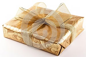 Luxuriously wrapped gift isolated on white background.