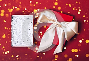 Luxuriously wrapped gift with lush ribbon