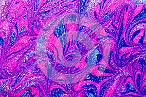 Luxury abstract background of glitter paint swirls