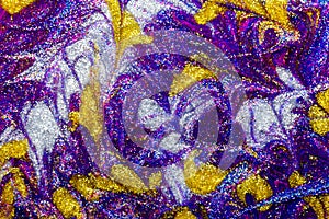 Luxury abstract background of glitter paint swirls