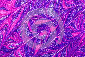 Luxury abstract background of glitter paint swirls