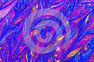 Luxury abstract background of glitter paint swirls