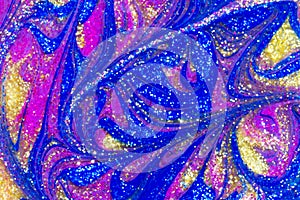 Luxury abstract background of glitter paint swirls