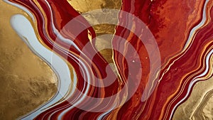 Luxury abstract fluid art painting in alcohol ink technique, mixture of red and gold paints. Imitation of marble stone cut.