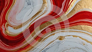 Luxury abstract fluid art painting in alcohol ink technique, mixture of red and gold paints. Imitation of marble stone cut.