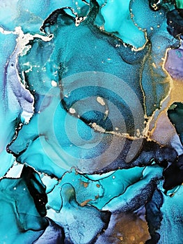 Luxury abstract fluid art painting background alcohol ink technique green and gold. Rough edges of paint flow out