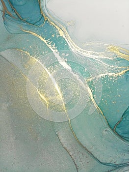 Luxury abstract fluid art painting background alcohol ink technique mint blue and gold. Marble texture photo