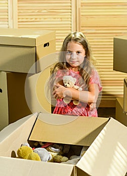 Luxury All Around. Moving concept. new apartment. happy child cardboard box. purchase of new habitation. Cardboard boxes