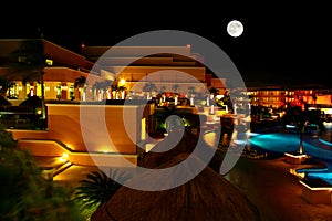 A luxury all inclusive beach resort at night