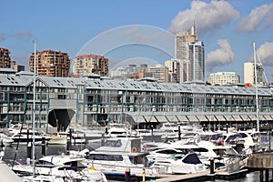 Luxury apartments and yachts in Sydney harbour of Australia