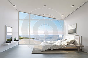 Luxury attic bedroom with panoramic windows. Minimalist design, ocean view