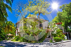 Luxury authentic historical villa in shadow of trees in Playa del Carmen, Yukatan, Mexico