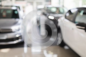 Luxury automobiles in vip showroom, blurred background