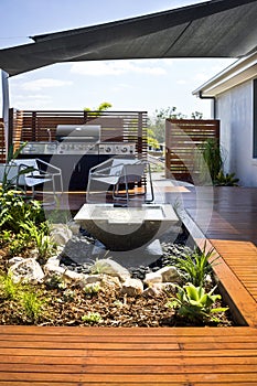 A luxury backyard home garden with lounge space