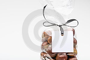 Luxury bag of chestnuts with blank label and copy space