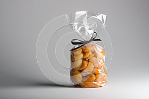 Luxury bag of dried apricots with ribbon and copy space