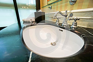 Luxury basin and faucet in bathroom