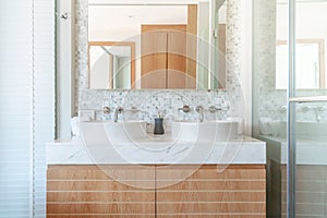 Luxury bathroom features basin, toilet in the house or home building