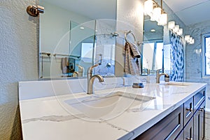 Luxury bathroom interior with blue dual washstand.