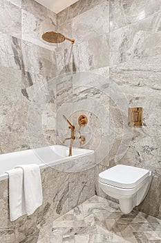 Luxury bathroom in marble tiles