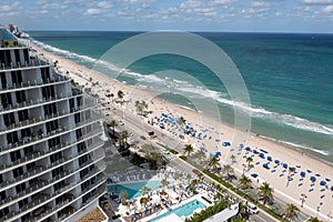 Luxury beach resorts welcome  vacationing tourist enjoying the beach in Fort Lauderdale Florida