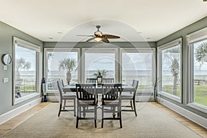 Luxury beach view diningroom with view of the ocean photo