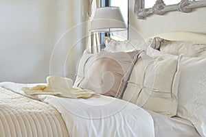 Luxury bedroom interior with decorative set on bed