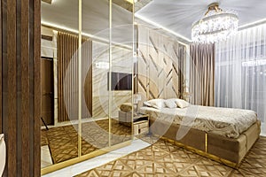 Luxury bedroom interior with parquet and mirror walls