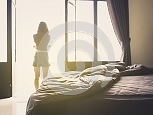 Luxury bedroom and woman taking off clothes