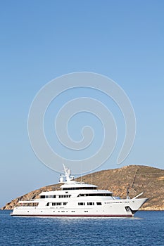 Luxury big mega motor yacht in the blue sea.