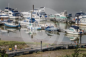 Luxury boats in marina in Rochester