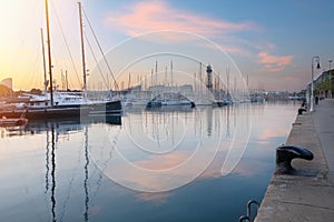 Luxury boats moored in the port. View of the harbor at sunset. Lifestyle, vacation concept