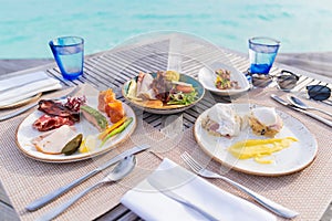 Luxury breakfast food on wooden table.