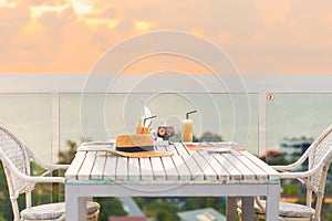 Luxury breakfast table for two with tropical sea view background