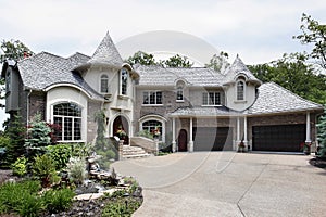 Luxury brick home with two turrets