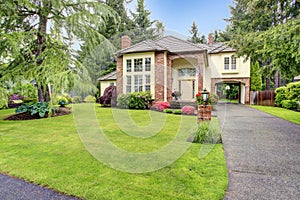 Luxury brick house with siding trim